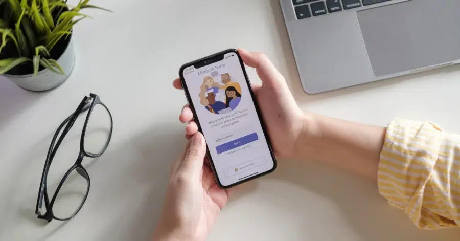 Woman checking Microsoft Teams on her phone
