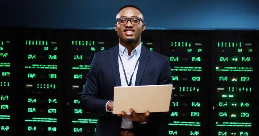 Market Data Vendor - Guy Holding Laptop