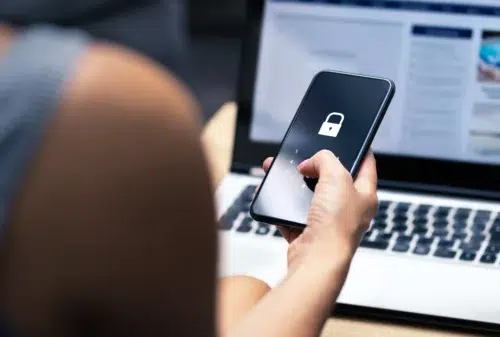Woman unlocking her phone using pass codes