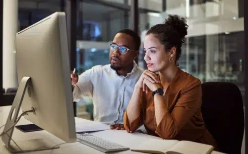 Team looking at the reasons why SaaS APIs are not enough