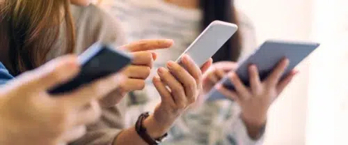 People on phones and tablet